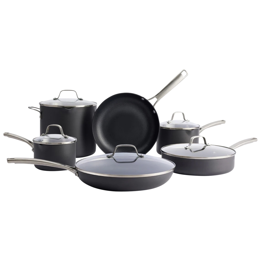 Cookware set featuring a variety of nonstick pots and pans, each with stainless steel handles and glass lids.