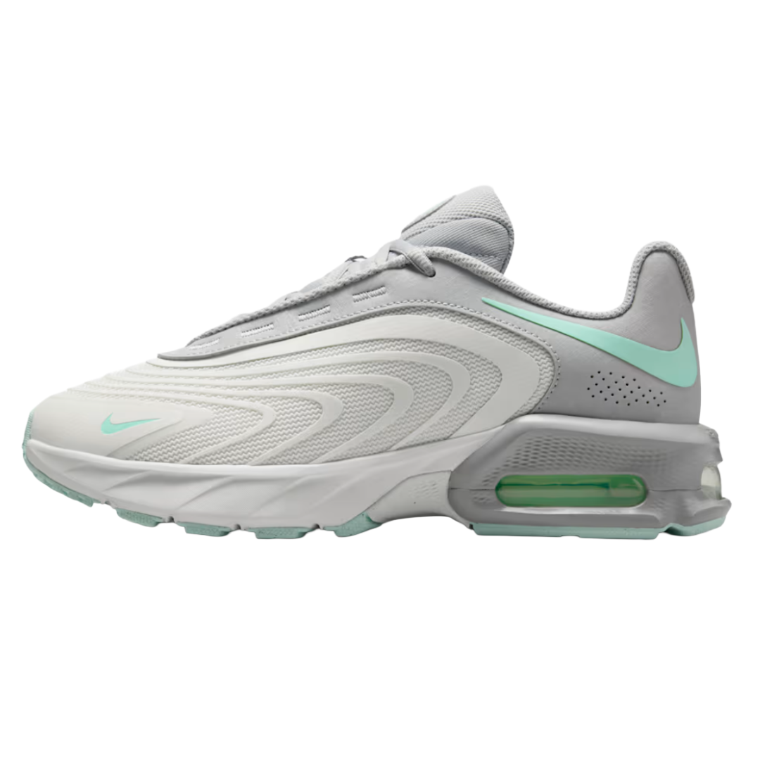 Nike Air Max Plus 2 shoe in light grey with mint green accents and visible air cushioning in the sole.