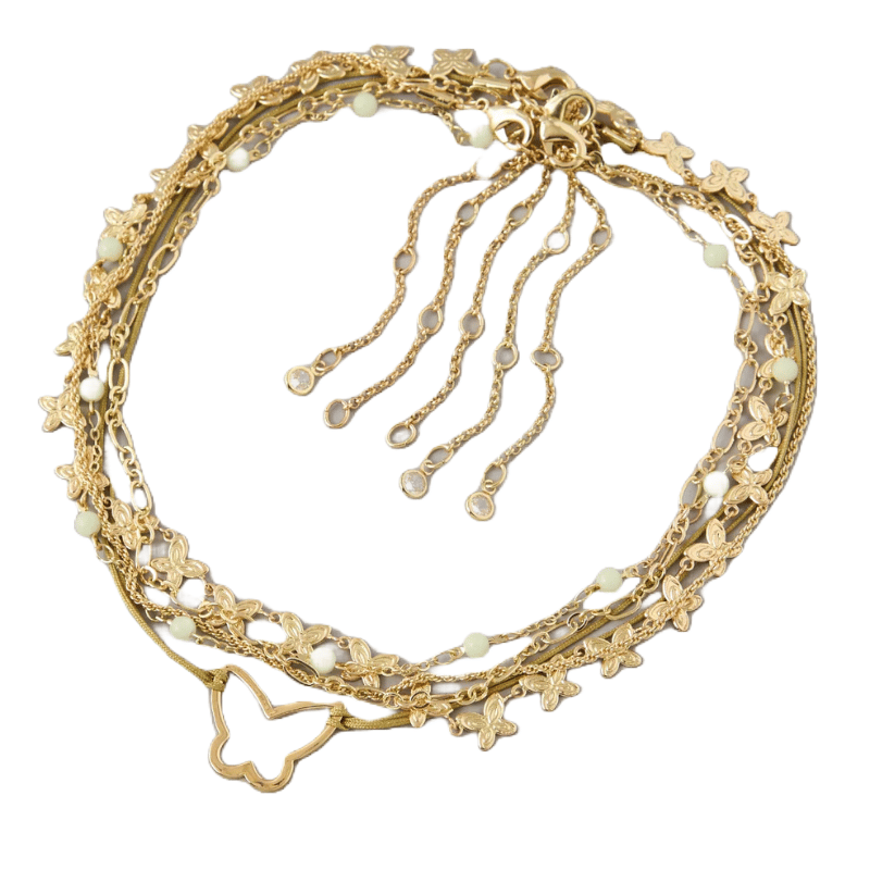 A set of five gold-tone choker necklaces featuring butterfly motifs, star and moon charms, and delicate chains with faux pearl accents. Some necklaces include pendants and dangling elements.