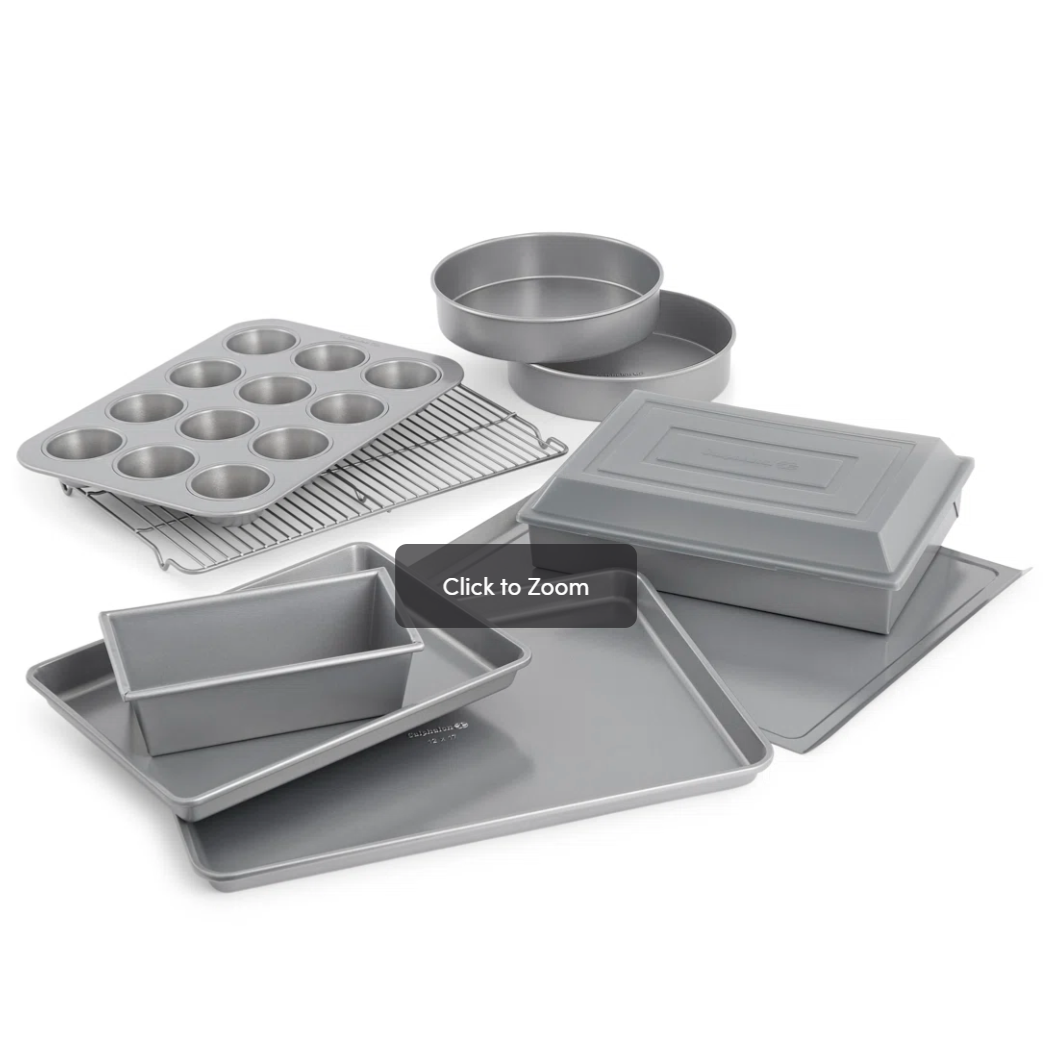 Baking set with a muffin tin, loaf pan, round cake pans, baking sheets, cooling rack, and a covered rectangular pan.