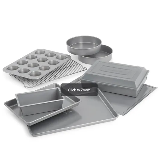 Baking set with a muffin tin, loaf pan, round cake pans, baking sheets, cooling rack, and a covered rectangular pan.