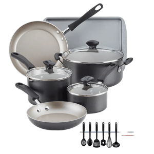 Cookware set including two frying pans, three lidded saucepans, a stockpot, a baking sheet, and six kitchen tools such as spoons, slotted turner, whisk, and pasta server.