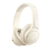 A pair of white over-ear headphones with the brand name \“Soundcore\“ visible on the headband.