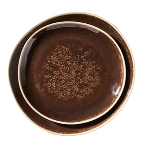 Two brown ceramic plates with a textured pattern and slightly curved edges, one smaller plate nested inside a larger one.