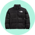 Black North Face puffer jacket with a logo on the chest, featuring a high collar, front zipper, and side pockets.