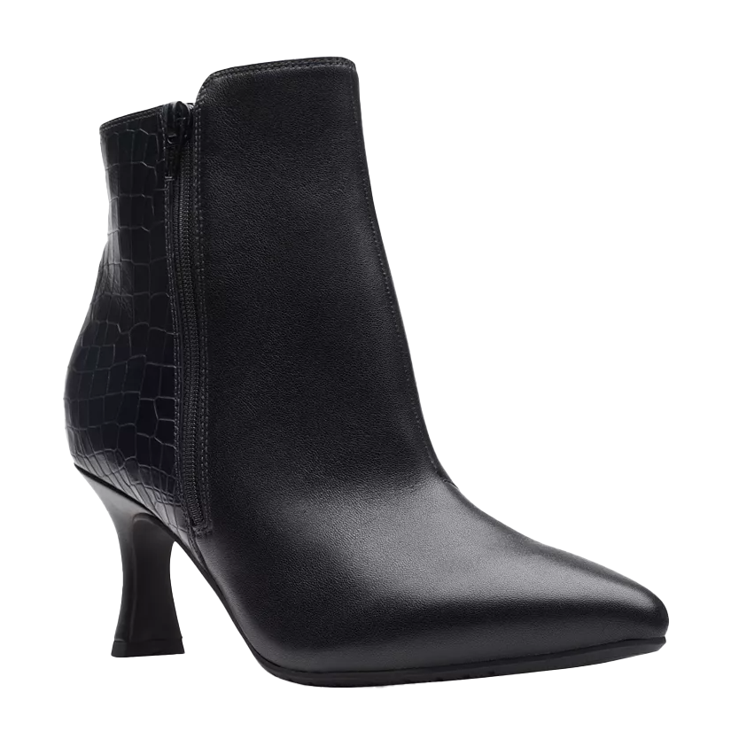 The Clarks Kataleyna Pointed-Toe Boots feature a black leather finish with a textured pattern on the back. They have a sleek design, a side zipper, and a stylish mid-height heel.