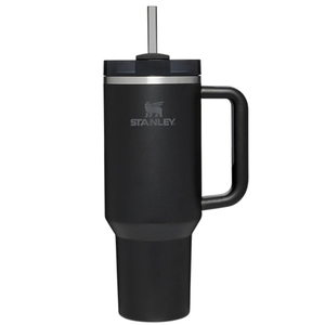 Black Stanley travel mug with a handle and straw lid.