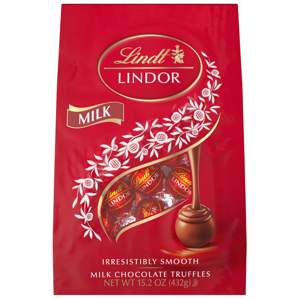 Lindt Lindor Milk Chocolate Truffles, 15.2 oz (432g), packaged in a red bag with a logo and decorative white designs, showcasing chocolates with a smooth inside and hard outer shell.