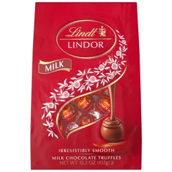 Lindt Lindor Milk Chocolate Truffles, 15.2 oz (432g), packaged in a red bag with a logo and decorative white designs, showcasing chocolates with a smooth inside and hard outer shell.