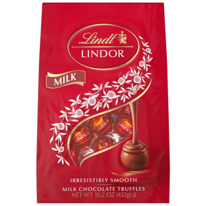 Lindt Lindor Milk Chocolate Truffles, 15.2 oz (432g), packaged in a red bag with a logo and decorative white designs, showcasing chocolates with a smooth inside and hard outer shell.
