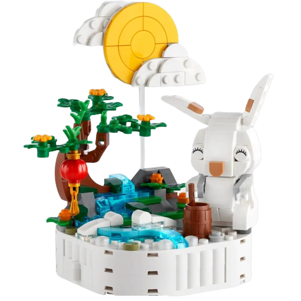 LEGO set featuring a white rabbit, a tree, flowing water, and a cloud with a sun.