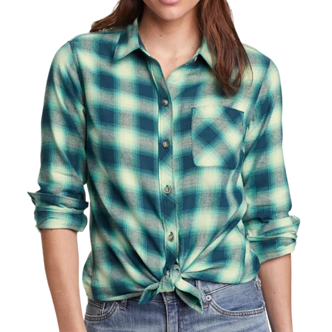 Long-sleeve plaid shirt in shades of green and blue with a button-up front, chest pocket, and tied at the waist. Paired with blue jeans.