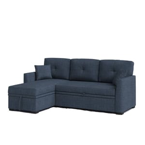 A dark blue L-shaped sectional sofa with a chaise on the left, featuring button-tufted back cushions and a matching pillow.