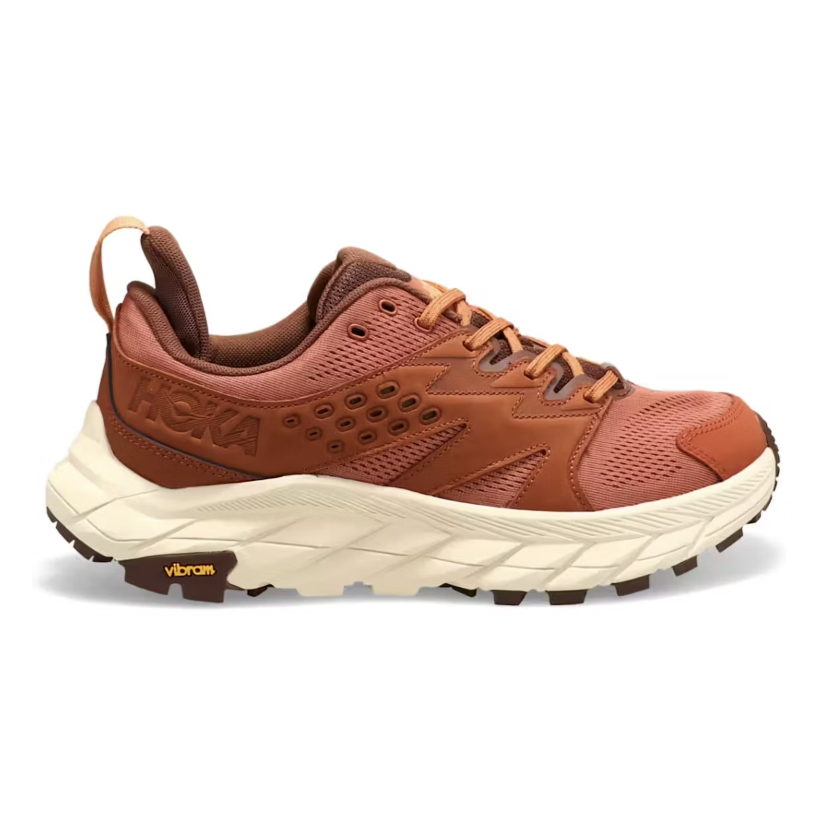 Hoka hiking shoe in terracotta color with a Vibram sole, featuring breathable mesh and synthetic overlays for durability.