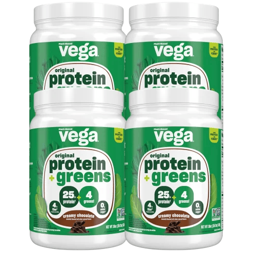 Vega Original Protein + Greens in creamy chocolate flavor, featuring 25g of protein, 4g of greens, and no added sugar. Non-GMO and plant-based. Four containers shown.