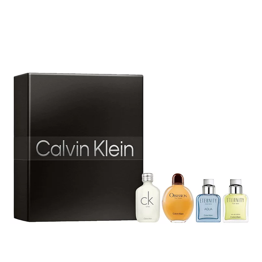 Calvin Klein fragrance gift set featuring four mini bottles: CK One, Obsession, Eternity Aqua, and Eternity for Men, displayed beside a black box with the brand's logo.