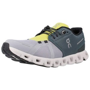 On Running Men's Cloud 5 shoe features a mesh upper in gray and yellow with dark accents, a cushioned CloudTec sole in white with distinctive hollow pods for lightweight comfort, and lace-up closure for a secure fit.