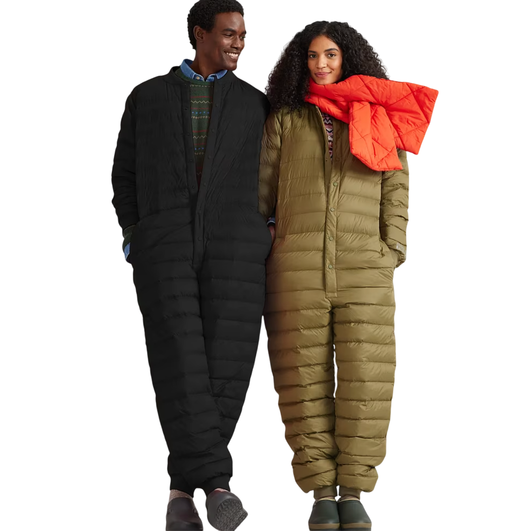 Two people wearing one-piece padded jumpsuits; one in black and the other in olive green, with the person in the green suit also wearing a bright orange scarf.