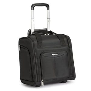 Black rolling tote bag with side and front zip compartments, featuring a retractable handle and tandem carrying straps. Ideal for travel or business use.