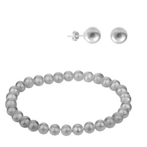 Simulated pearl bracelet and earrings set featuring round, lustrous pearls. The bracelet consists of a continuous strand of pearls, while the earrings are simple stud style for a classic and elegant look.