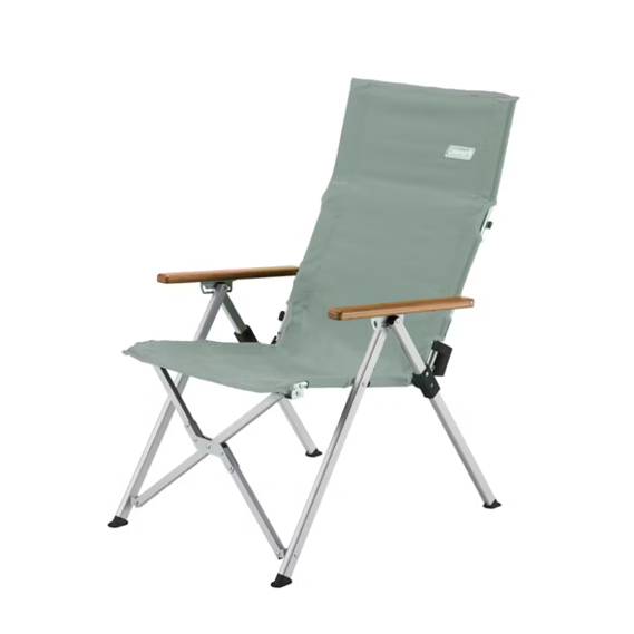 This is a Coleman branded sling chair with a grey fabric seat, wooden armrests, and a collapsible silver metal frame designed for portable outdoor use.