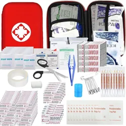 A compact first aid kit featuring bandages, antiseptic wipes, adhesive tape, scissors, tweezers, safety pins, a cold pack, and burn dressings, all housed in a red case with a medical cross.