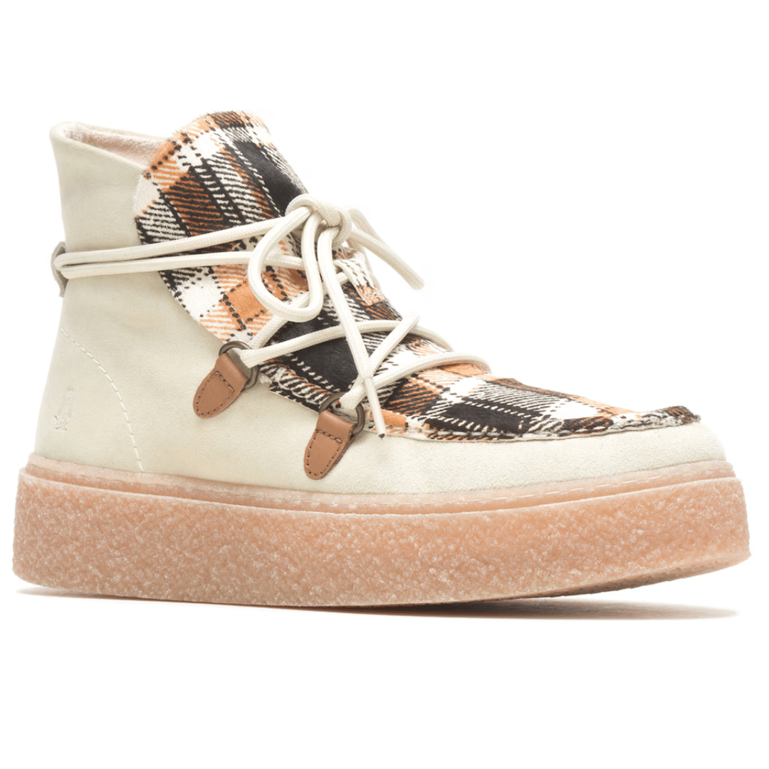 High-top sneaker with cream leather and patterned textile panels, featuring a chunky rubber sole.