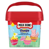Milk-Bone Peeps Easter Dog Treats are marshmallow-flavored dog biscuits in a 22 oz red container. The packaging features colorful Easter-themed illustrations, including bunnies and decorated eggs, highlighting its limited edition status.
