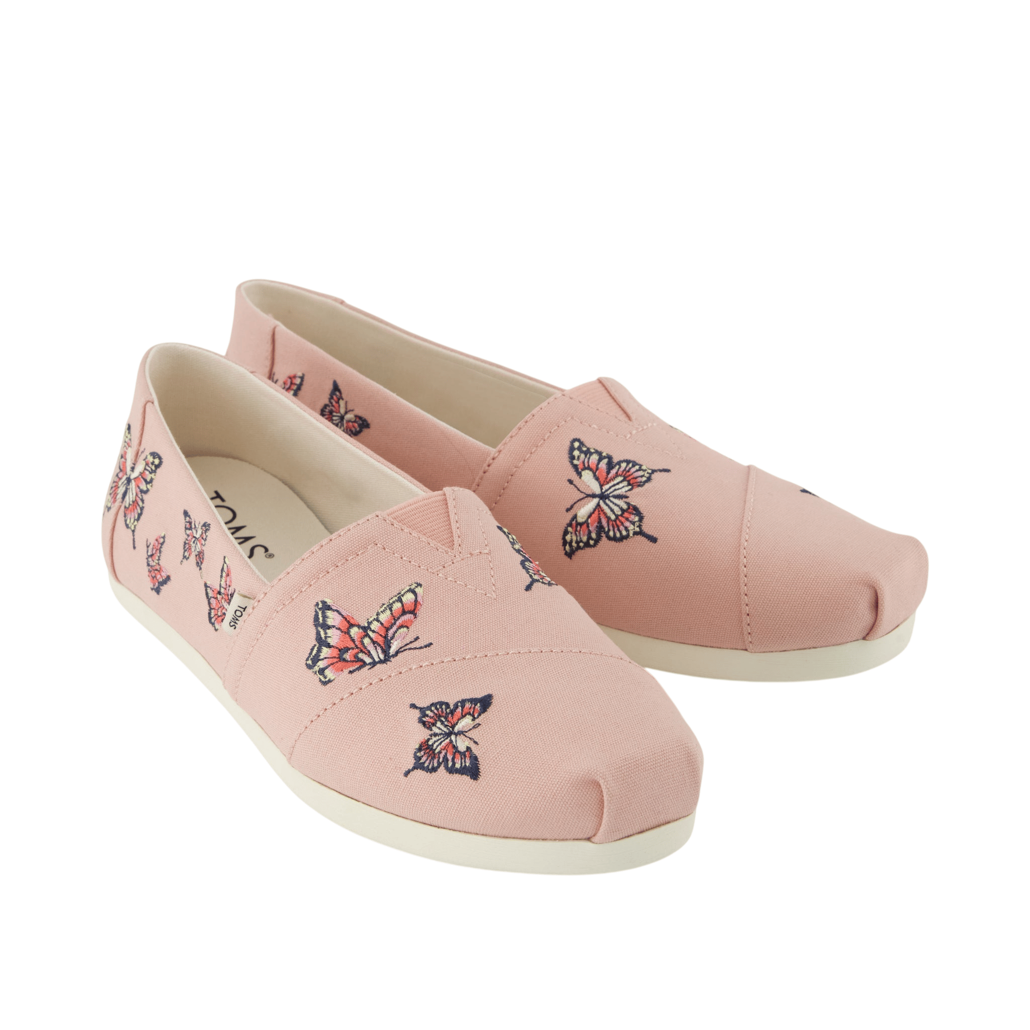 Pink slip-on shoes with embroidered multicolored butterflies.