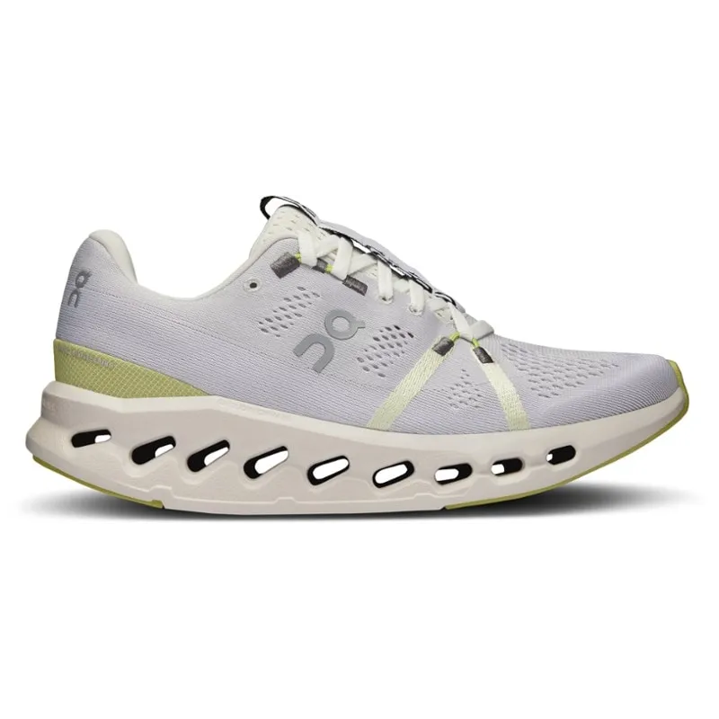A light grey running shoe with distinctive large oval cutouts in the sole and neon yellow accents.