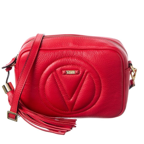 A red leather crossbody bag with a prominent V logo on the front, featuring gold-tone accents and a tassel detail.