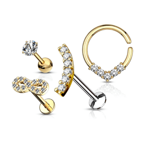 A set of four gold-toned earrings featuring two stud designs: a single crystal and an infinity symbol adorned with crystals, as well as two hoops, one with an arc of crystals and the other embellished with crystals at the bottom.