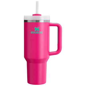 Pink Stanley travel mug with handle, straw, and logo.