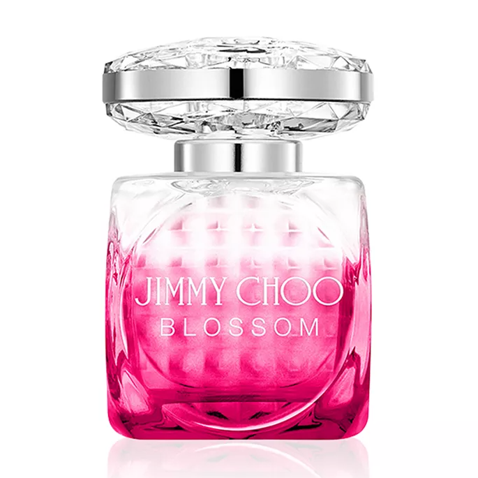 Jimmy Choo Blossom perfume in a pink ombré bottle with a jewel-like cap.