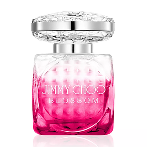 Jimmy Choo Blossom perfume in a pink ombré bottle with a jewel-like cap.