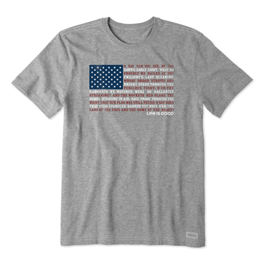 Gray t-shirt with the American flag and the words of \“The Star-Spangled Banner\“ printed in the flag's stripes, along with the Life is Good logo.