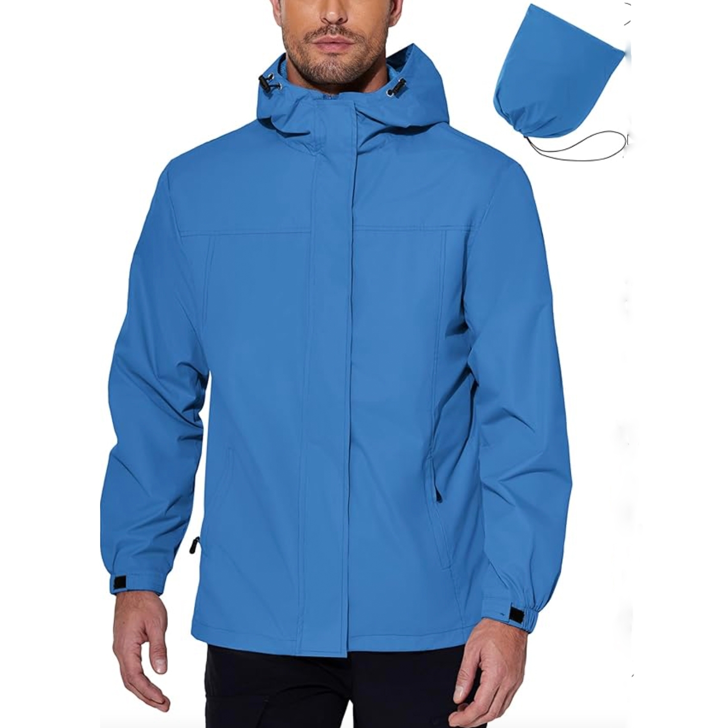 A man wearing a blue hooded jacket with a front zipper and pockets.