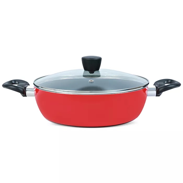 Red non-stick wok with a glass lid and black handles.