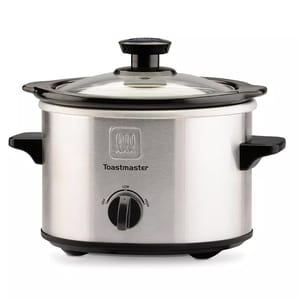 A Toastmaster slow cooker with a stainless steel exterior, black handles, and a glass lid. It features an adjustable knob for off, low, and high heat settings.