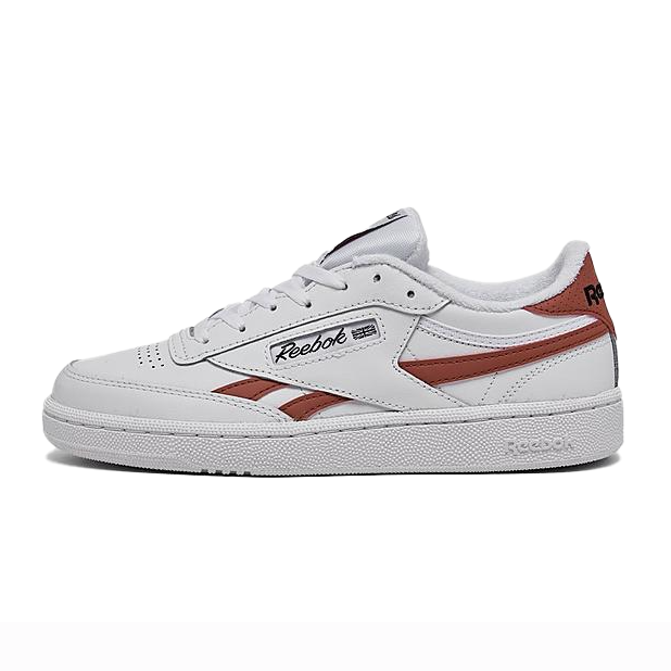 Reebok Club C Leather Shoes feature a classic white leather design with brown accents, a low-cut silhouette, and Reebok branding on the side and heel. They have a textured rubber sole for grip and a lace-up closure for a secure fit.