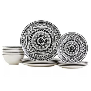 Black and white dinnerware set featuring plates and bowls with intricate mandala designs.