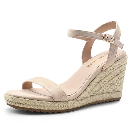 Beige wedge sandal with a woven platform, featuring an ankle strap with a buckle closure.