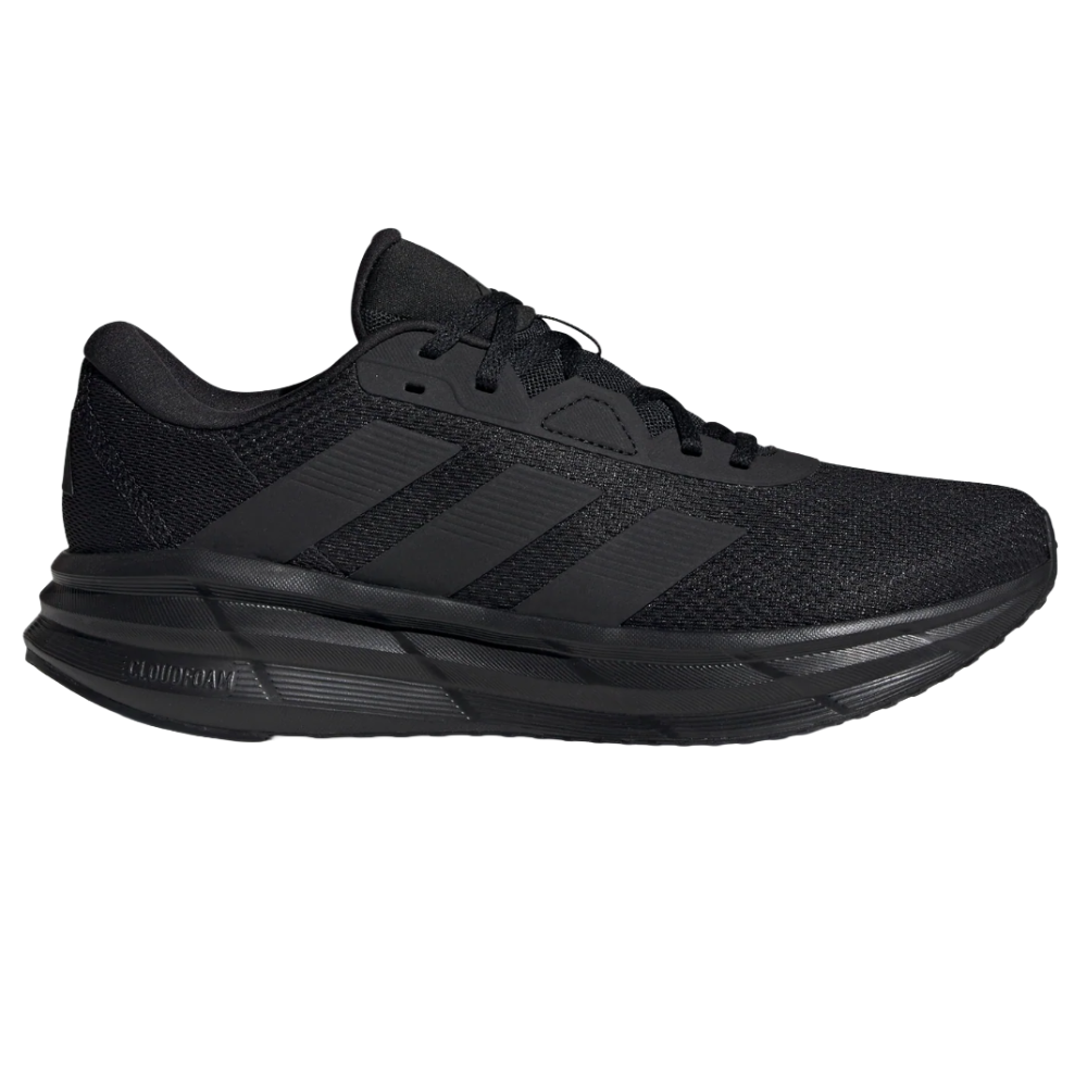 All-black Adidas running shoe with Cloudfoam cushioning, featuring a mesh upper and three stripes on the side.