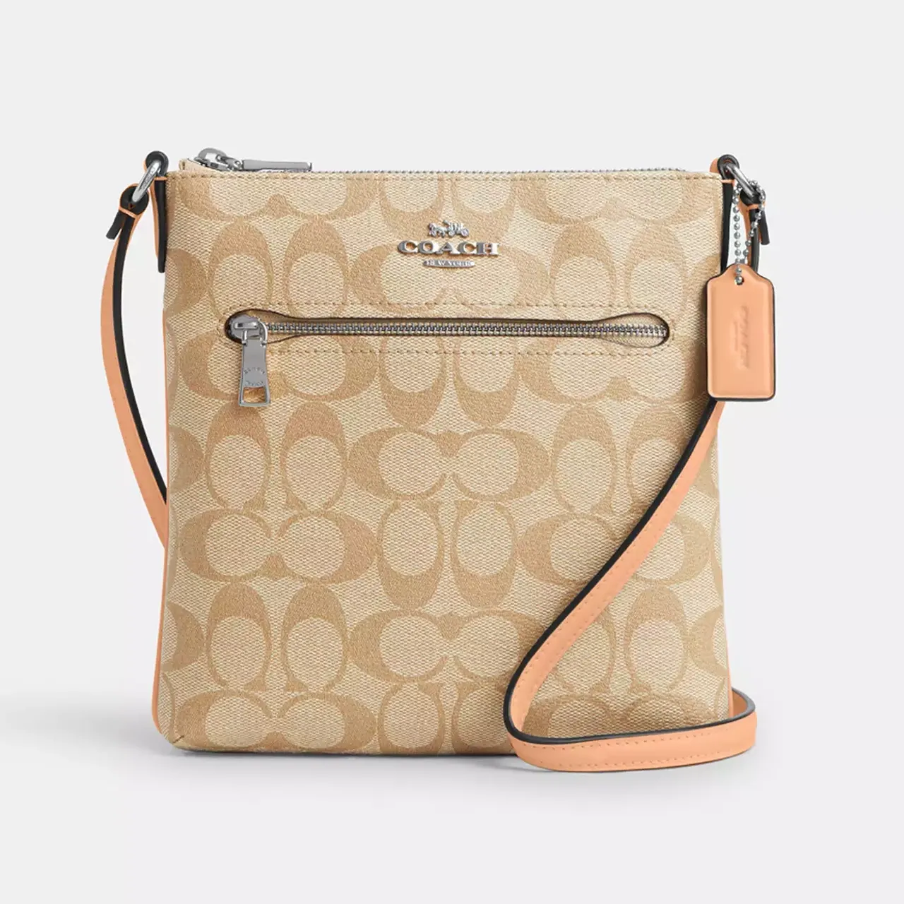 A Coach brand crossbody bag with a beige monogram pattern and tan leather accents.