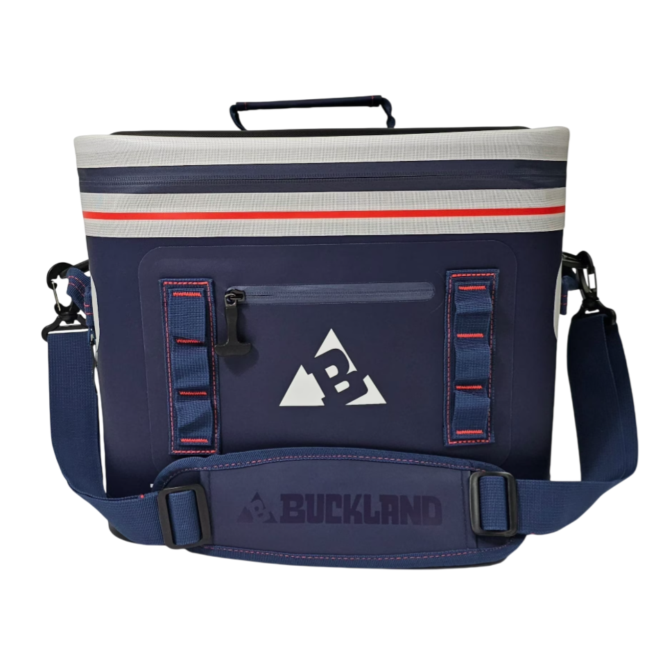 A blue soft-sided cooler bag with a shoulder strap and handle, featuring the Buckland logo on the front.