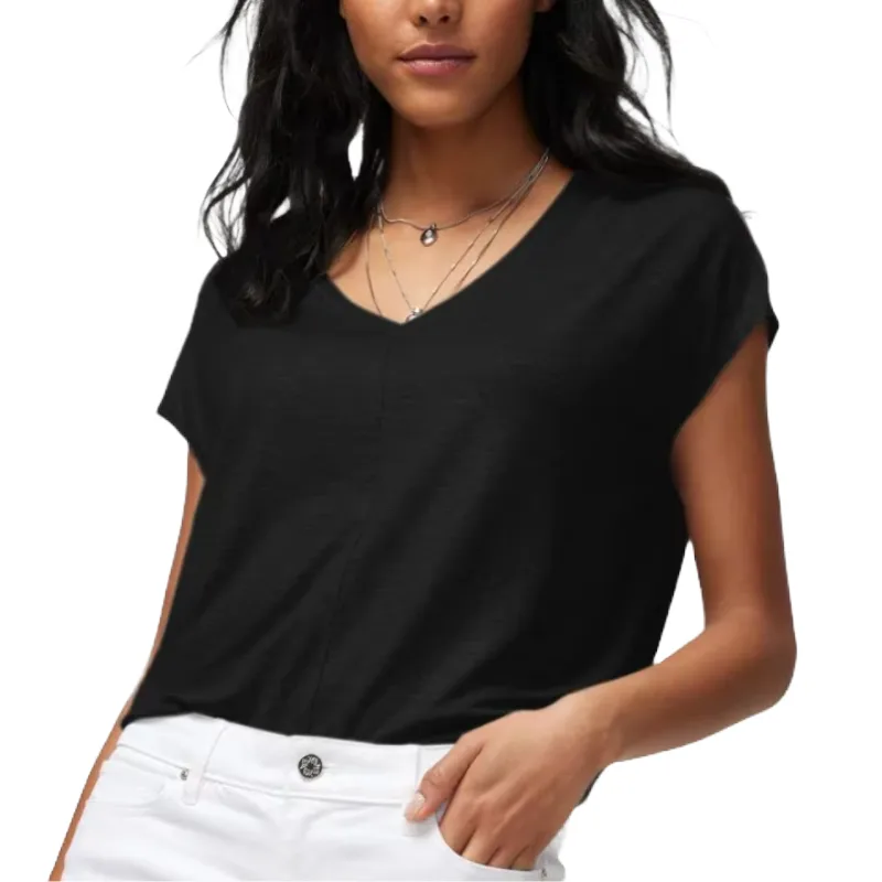 Black V-neck tee with short sleeves, paired with white pants. Features a relaxed fit and minimalistic design, complemented by layered necklaces.