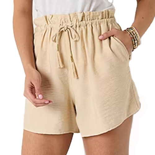 Beige high-waisted shorts with an elastic waistband, drawstring, and side pockets, worn with a white top and bracelets.