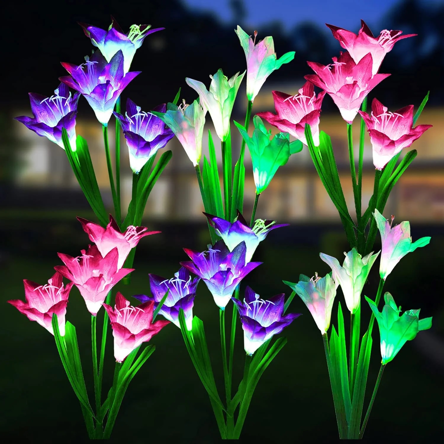 A collection of artificial lily flowers with LED lights in various colors.