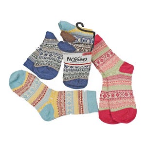 6pk Mossimo Women's Boot Socks featuring colorful patterns in red, blue, and yellow tones, including Fair Isle designs, suitable for pairing with boots.
