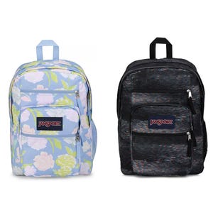 Two JanSport backpacks, one with a light blue and floral design, the other black with colorful speckles.